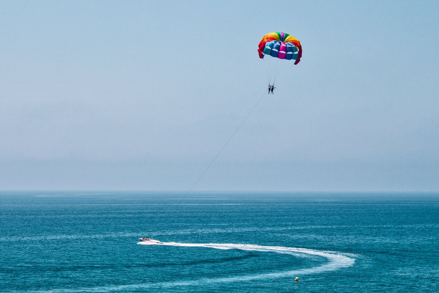 Two People Parasailing